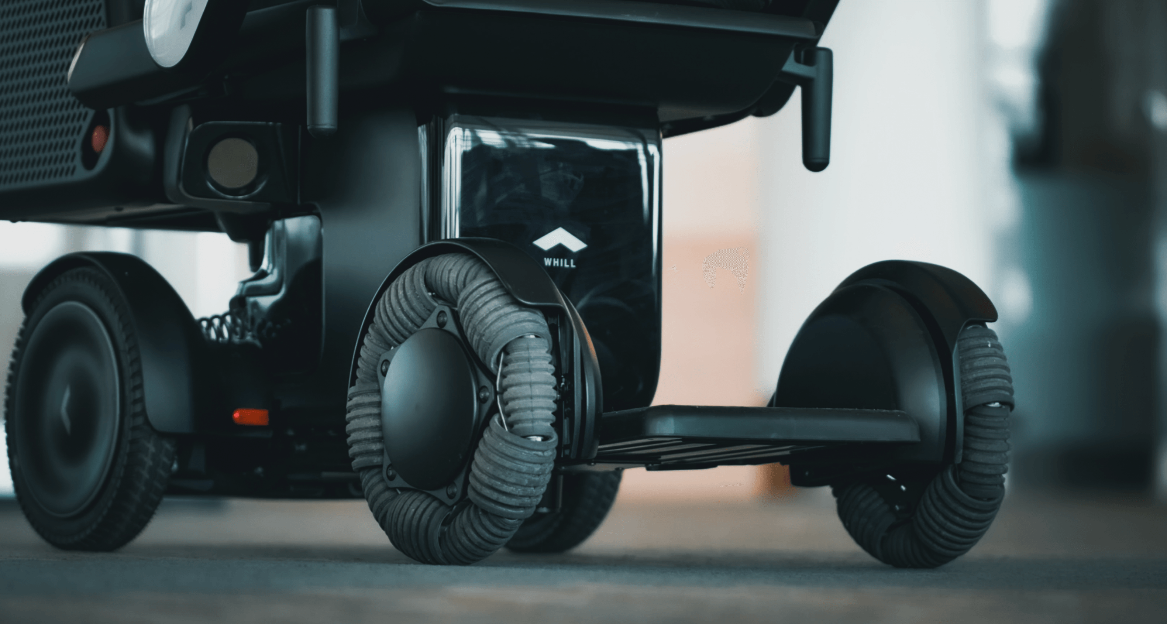 WHILL mobility service contact background