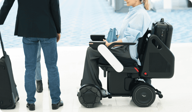 WHILL Model C2 autonomous wheelchair side view