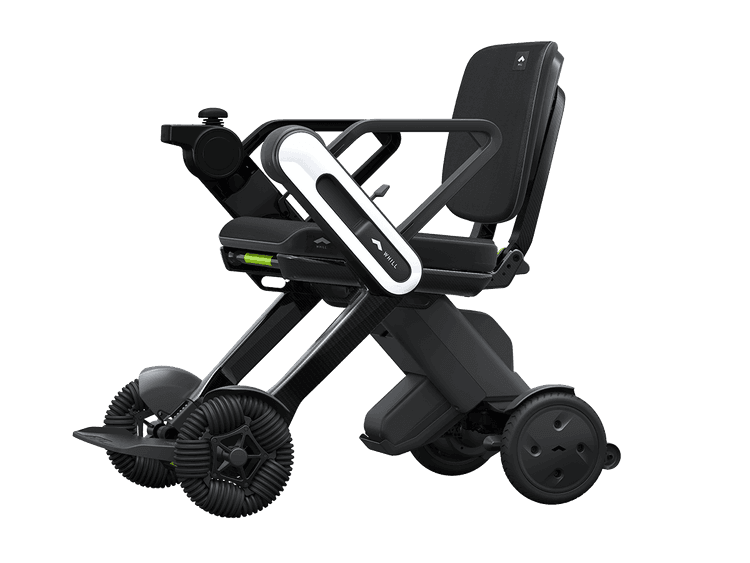 WHILL Model C Lite in Schwarz mit weißer Seitenverkleidung, seitliche Ansicht, ausgeklappt mit omnidirektionalen Rädern.