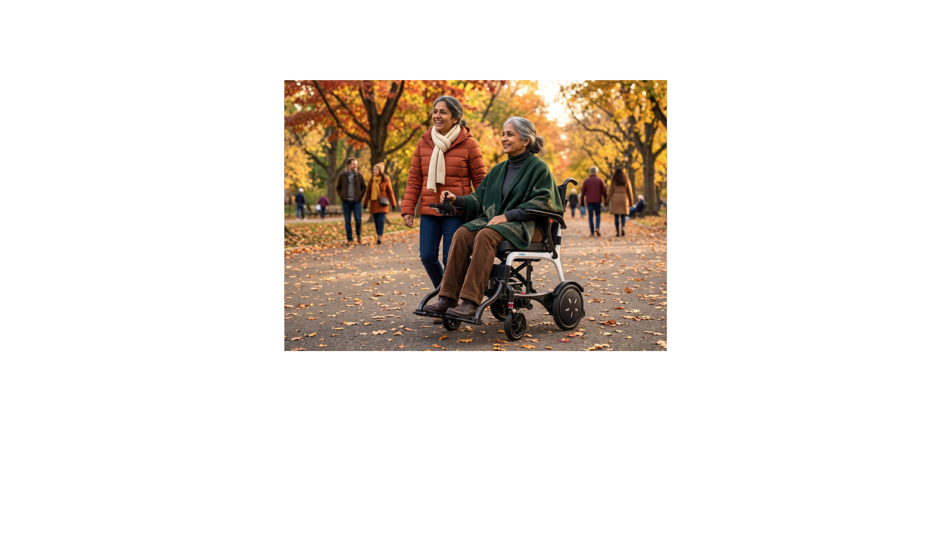 Women walking next to another women in Electric Wheelchair in a park